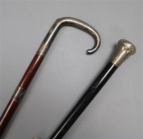 Two silver handled walking sticks longest 91cm
